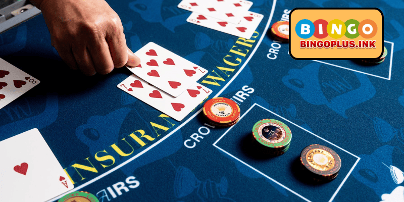 Blackjack table showing player hand and dealer upcard during a casino game